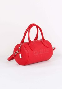 Borsa a mano in pelle rossa dalla forma arrotondata, con doppi manici, tracolla removibile, logo in rilievo e dettaglio con cerniera argentata.