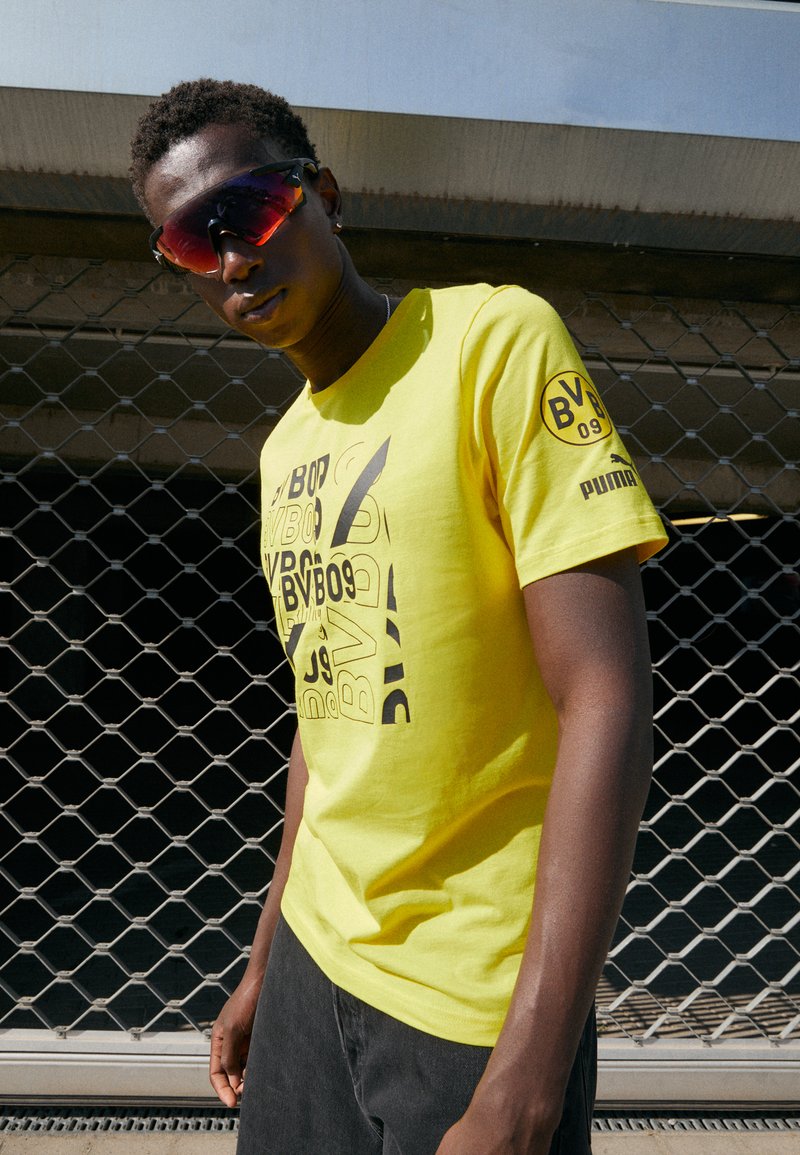 Puma BVB BORUSSIA DORTMUND FTBLCORE - T-shirt z nadrukiem/Å¼Ã³Åty - Zalando.pl