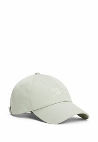 Gorra de béisbol verde claro hecha de algodón con visera curva, que presenta un logo bordado de "tommy jeans" en la parte frontal y una correa ajustable en la parte trasera.