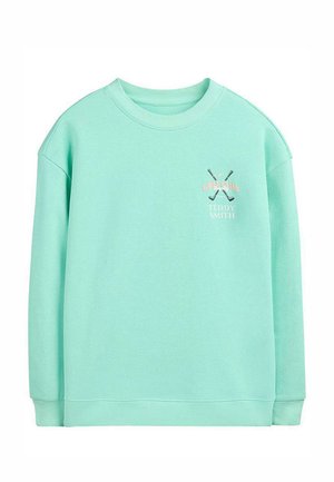 Sweat-shirt vert menthe à col rond avec des clubs de golf croisés et le texte "Golf Club Teddy Smith" sur le côté gauche de la poitrine.