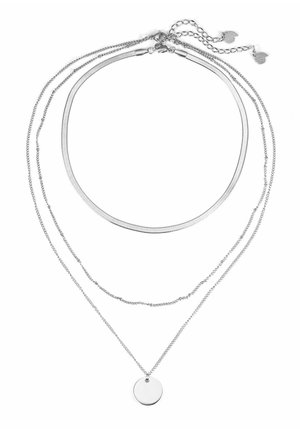 Silver multi-layered necklace featuring thin, varying chain styles, including a round pendant, exhibiting smooth metallic texture.