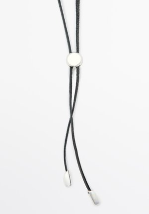 Black leather bolo tie with a silver circular bead and metal tips, featuring a sleek, minimal design suitable for various outfits.