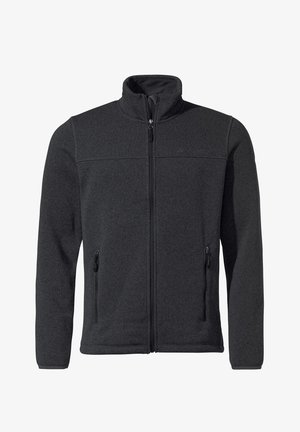 Veste polaire noire avec col montant, fermeture éclair complète, deux poches latérales, tissu texturé et logo discret sur la poitrine. Idéale pour le superposition.