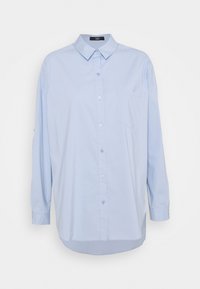 Light blue long-sleeve button-up shirt with pointed collar and chest pocket, displayed flat against a white background.
