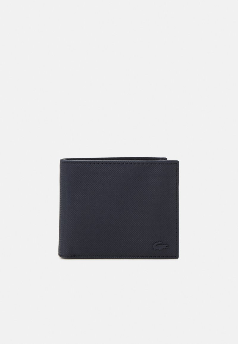 Navy bi-fold wallet in textured synthetic material. Features subtle embossed logo and neatly stitched edges. Compact design for easy storage.