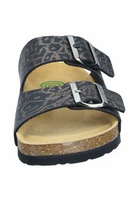 Black sandals with a leopard print pattern, two adjustable silver buckles, cork sole, and a textured footbed for comfort.
