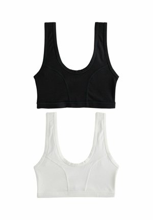 Deux soutiens-gorge de sport, un noir et un blanc, placés verticalement sur un fond blanc avec un décolleté arrondi et des bretelles larges.