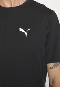 Puma RUN CLOUDSPUN - T-Shirt sport - puma black