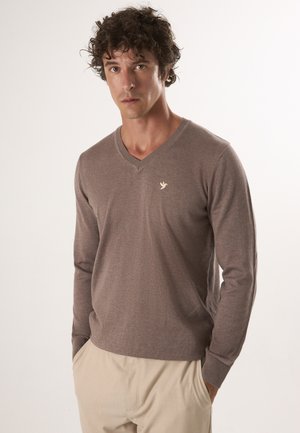 - Sweter