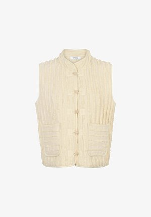 Kremna telovnik iz teksturirane tkanine z navpičnimi črtami. Ima mandarin ovratnik, gumbe spredaj in dva stranska žepa.