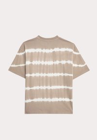 Beige cotton t-shirt featuring horizontal white tie-dye stripes, crew neckline, short sleeves, and a relaxed fit.