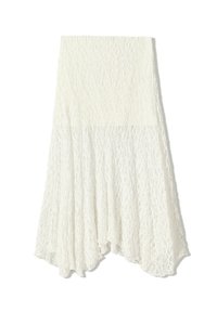 White lace skirt with a textured pattern, featuring an asymmetrical hemline and a flowing silhouette, made from lightweight fabric.