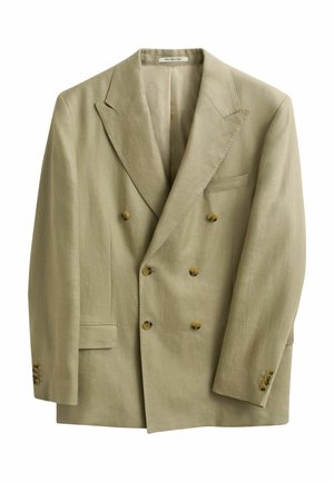 Blazer beige croisé avec revers à pointe, six boutons marron, trois boutons de manchette et deux poches avant, présenté sur fond blanc.