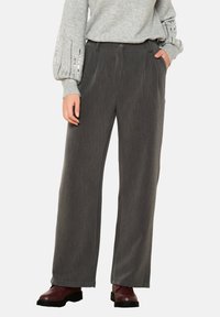 Gray wide-leg trousers with a textured finish, featuring front pleats and a button closure. Paired with a light gray sweater.