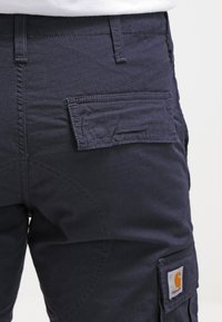 Carhartt WIP PANT COLUMBIA  - Hlačami s stranskimi žepi - dark navy rinsed