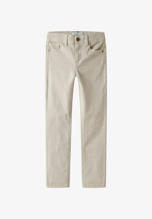 Pantalons en mélange de coton beige à coupe slim, avec une fermeture à bouton sur le devant, cinq poches et des détails de couture subtils.