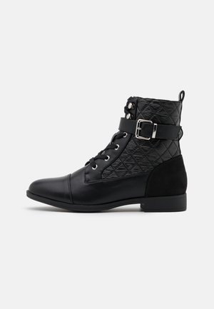 Bottines à lacets - black