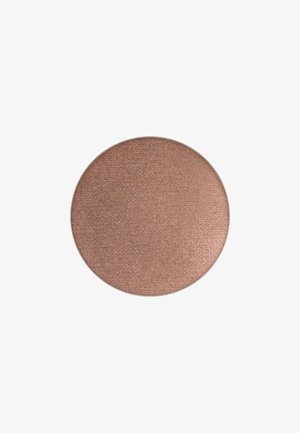 Ronde ogen-schaduwpan in een glanzende bronzen tint. Zachte textuur met een subtiele glans, metallic afwerking en een fijn gemalen uiterlijk.