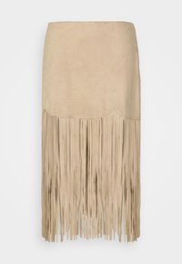 Beige velúr szoknya rojtos szegéllyel, díszvarrással a tetején. A dizájn letisztult és középhosszú.