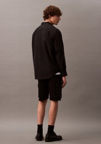 Calvin Klein Jeans COMFORT  - Lühikesed püksid - black