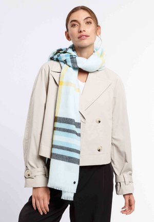 Sciarpa a quadretti blu chiaro con strisce gialle, nere e grigie. Realizzata in morbido tessuto, presenta bordi frangiati e una consistenza liscia.