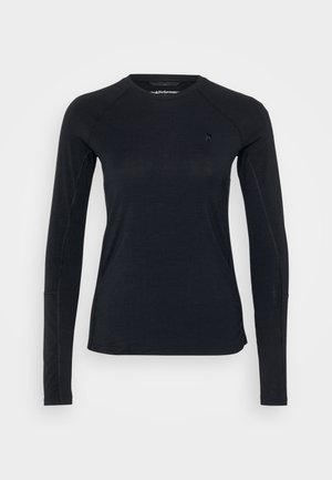 Ilgų rankovių juodas sportinis marškinėlis su apvaliu iškirpimu ir raglan rankovėmis, su siūlėmis ir mažuoju logotipu ant krūtinės.