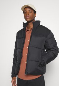 Tommy Hilfiger NEW YORK PUFFER JACKET - Giacca invernale - black