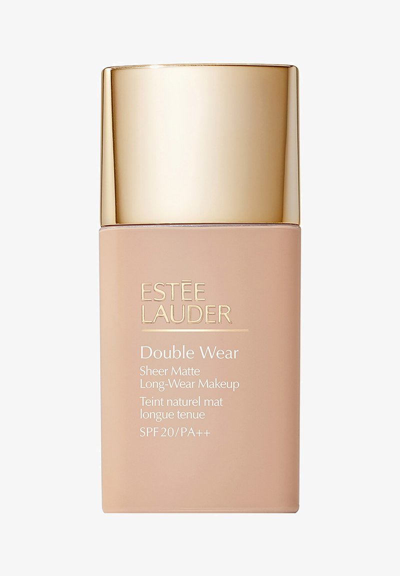 Flacon de maquillage longue tenue Estée Lauder Double Wear Sheer Matte avec bouchon doré, protection SPF 20/PA++, fond de teint liquide beige.