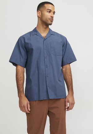 Korte mouwen, een-knops overhemd van marineblauwe katoen, met een enkele borstzak en een casual kraagontwerp.