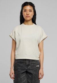 Urban Classics LADIES SHORT PIGMENT DYE CUT ON SLEEVE TEE - Pamata T-krekls - palesasphalt