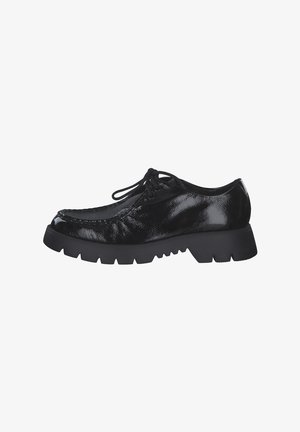 Black patent leather shoe with a rounded toe, lace-up design, and a thick, rugged sole featuring zigzag pattern details.