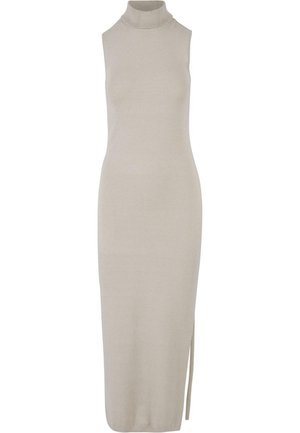 Bež kõrge krae ja ilma varrukateta kudum dresses, mis järgib kehajoont ja mille küljes on mõnus liikuvust võimaldav lõhik.