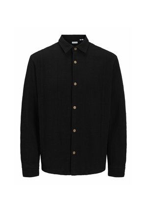 Black button-up shirt made of textured fabric. Features a pointed collar, long sleeves, and brown buttons along the front.