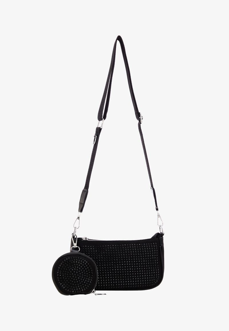 Sort crossbody taske med tekstureret overflade, featuring naglede detaljer og en aftagelig rund pung. Justerbar rem og lynlåslukning.