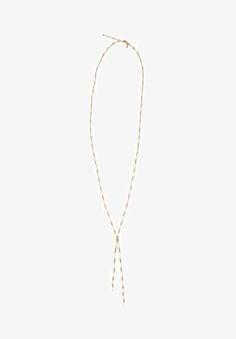 Collier délicat en chaîne d'or avec de petits détails en perles, présentant une chute en forme de Y avec deux brins suspendus.