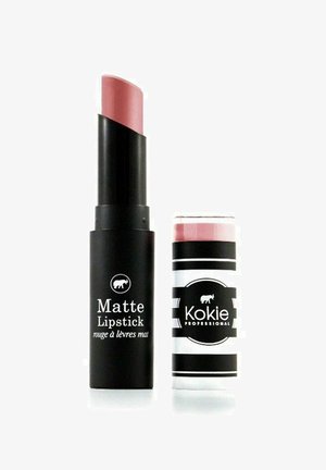 Matte huulipuna mustassa putkessa, jossa valkoista tekstiä, jonka sisällä on pehmeän vaaleanpunainen huulipuna. Toissijainen kuvioitu putki valkoisena ja mustana osoittaa brändin nimen.