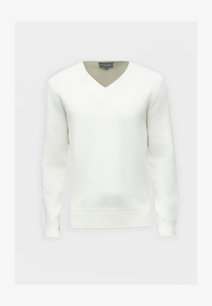 Pulover alb din bumbac texturat, cu decolteu în V și mâneci lungi. Are un guler verde contrastant și manșete și tiv cu refilet.
