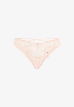 Helle rosa Tangas mit floralem Spitzenbesatz, vorne transparent und mit überkreuzten elastischen Bändern. Kleine dekorative Steine hinzugefügt.