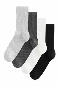 Fyra par strumpor i grått, mörkgrått, vitt och svart. Ribbade textur, medellång längd, med förstärkta tår och hälar. Klassisk design.