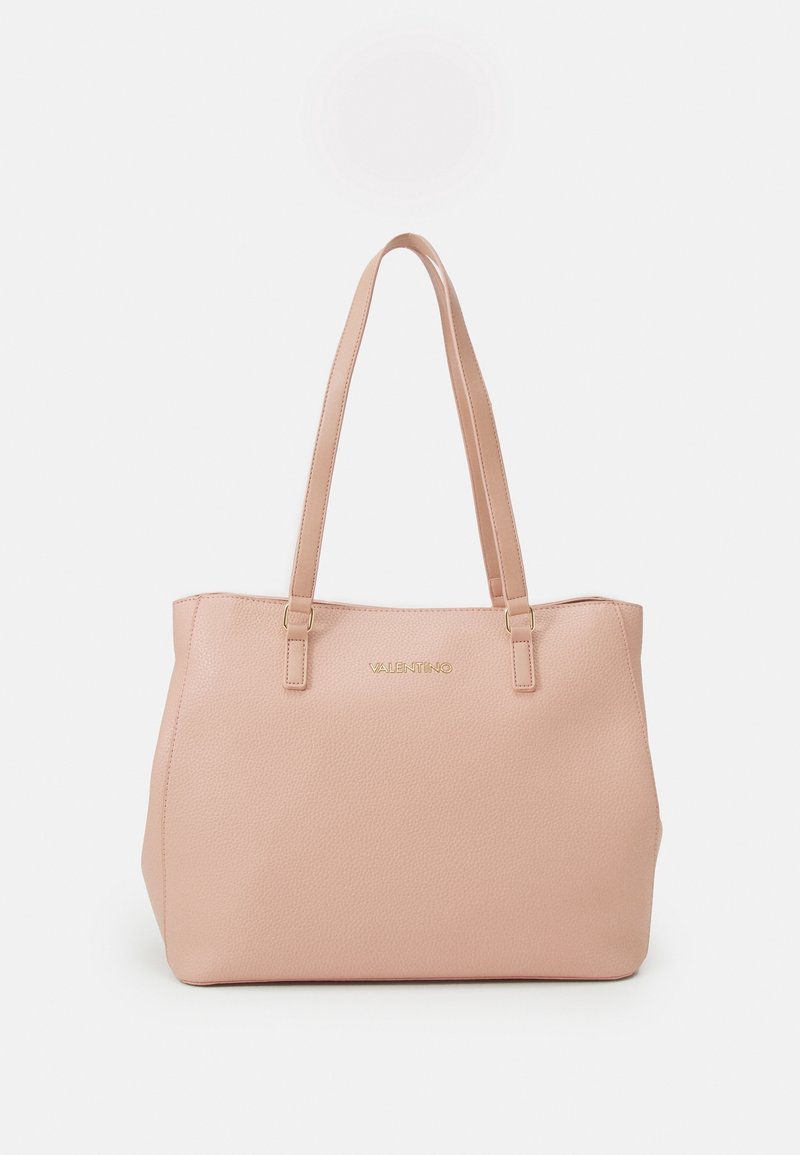 Pink pebbled leather tote bag with two shoulder straps, gold logo detailing, and a structured shape, featuring textured surface.