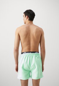 Ellesse TEYNOR - Kopalne hlače - light green
