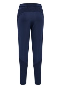 Marina blå träningsbyxor med en avsmalnande design, med en texturerad meshpanel på sidorna och en elastisk midja för komfort.