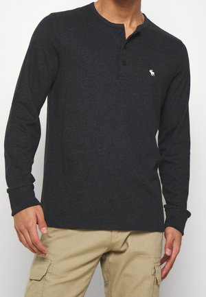 Långärmad tröja - black