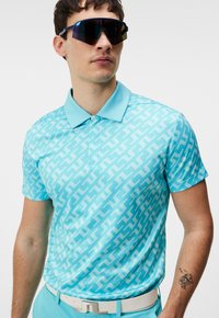 J.LINDEBERG Sports DARIO REGULAR FIT  - Polo shirt - bias bridge blue curacao