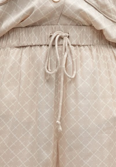 Svetlo béžová súprava oblečenia s textúrovaným geometrickým vzorom, ktorá má elastický pás a nastaviteľné viazanie. Dvoubarevná látka s jemným leskom.