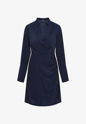 Tamsiai mėlynas apklijuotas suknelė su apykakle, ilgomis rankovėmis, mygtukų priekyje ir šoniniu raukinimu. Lygi tekstūra ir kelių ilgio dizainas.