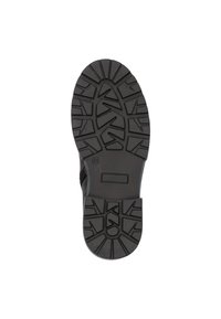 Semelle de chaussure en caoutchouc noir avec des motifs de semelle profonds pour une meilleure traction, dotée d'un design robuste et de bords plats pour assurer la stabilité.