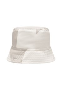 Klobúk so širokým okrajom v svetlej béžovej farbe s hladkým povrchom. Má geometrický vzor a mierne elastický okraj.