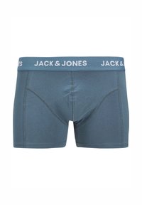 Blaue Baumwoll-Boxershorts mit einem weißen elastischen Bund, auf dem der Text "JACK & JONES" steht, und mit Schrittnaht für zusätzliche Struktur.