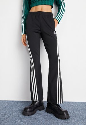 Pantalones deportivos - black